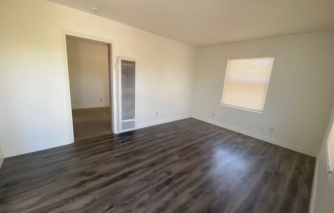 Upstairs 1 bedroom 1 bath unit with a one car garage included.