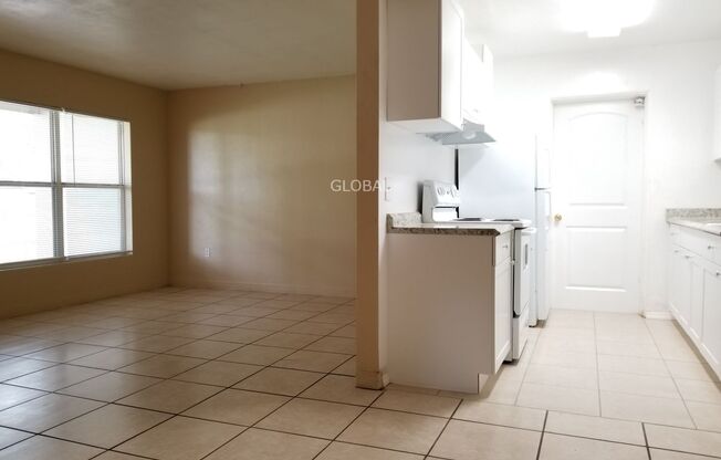 Charming 3-Bedroom Home with Spacious Backyard and One-Car Garage.