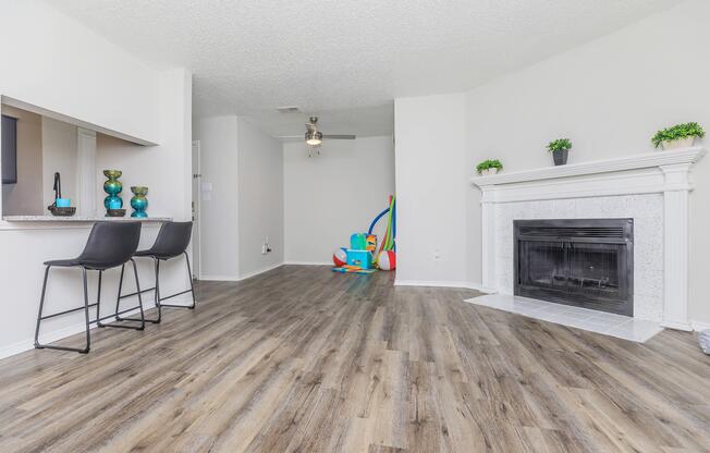 a living room with a wooden floor