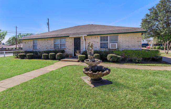 a large lawn in front of a house