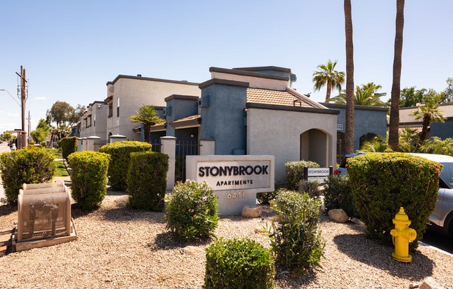 a home for sale is shown with a sign in front