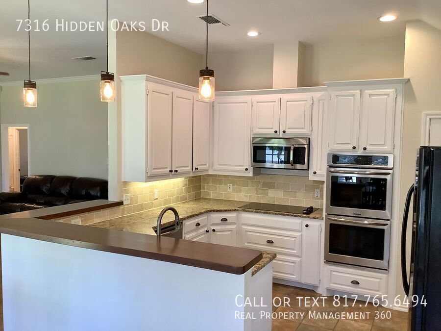 7316 HIDDEN OAKS DR