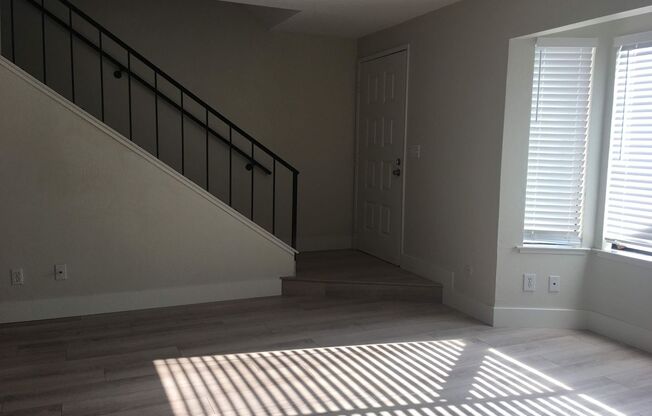 Freshly updated Woodside Park townhouse, close to Fresno State.