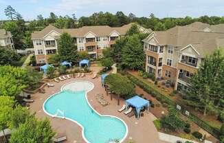 Saltwater pool with sundeck, fire pit, cabanas, WiFi, TV lounge and gas grills