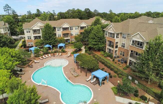 Saltwater pool with sundeck, fire pit, cabanas, WiFi, TV lounge and gas grills