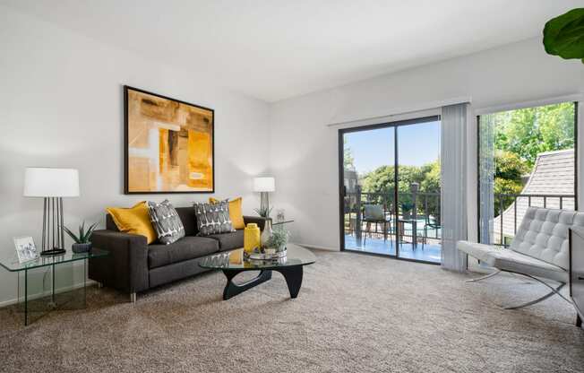 our apartments offer a living room with a sofa and a coffee table