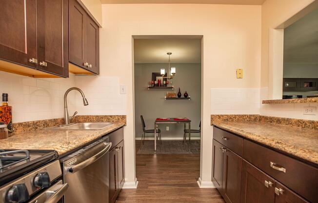 a kitchen with a stove and a sink