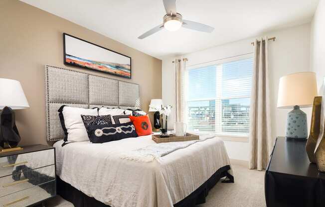 Large bedroom windows with stunning views at Metro West, 8055 Windrose Ave, TX