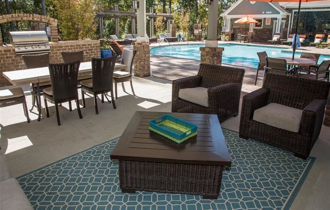 poolside grilling station and outdoor seating