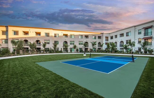 a large lawn in front of a pool
