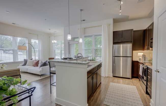 Kitchen Island With Pendent Lights at The Lincoln Apartments, Raleigh, NC