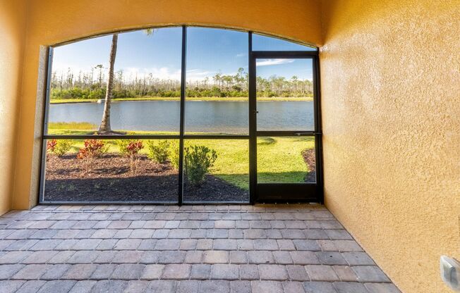 Stunning 2BR/2BA Acqua Ct. First-Floor Unit with Lake Views in Treviso Bay – Resort-Style Living Awaits!