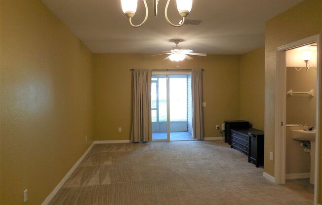4107 Plantation Cove Dr. Quiet, cozy townhouse with view of the grounds.