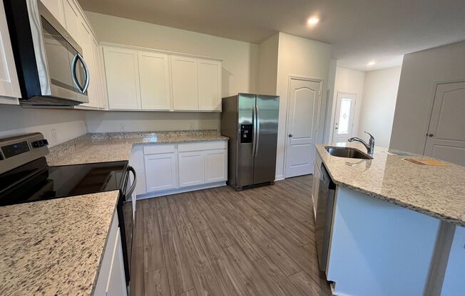 A stunning NEWLY BUILT HOME in Kissimmee, FL Move in Ready!