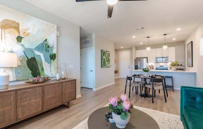 a living room with a dining room and a kitchen