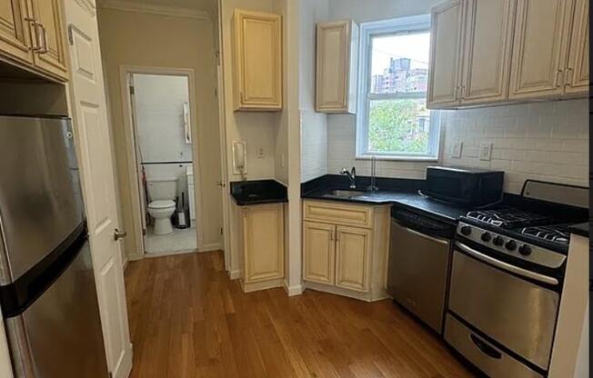 235 E 27 ST