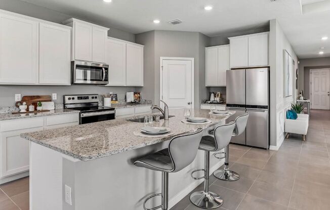 EXCEPTIONAL HOME IN BELLA LAGO PARRISH ! 4 BEDROOM HOME READY FOR YOU!