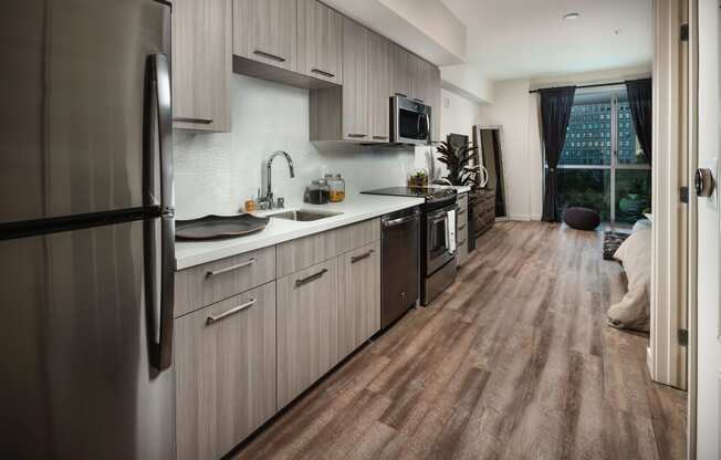 model kitchen with stainless steel appliances