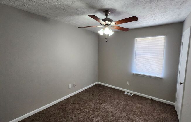 Spacious 4BR Split-Level Home with Fireplace & 2-Car Garage