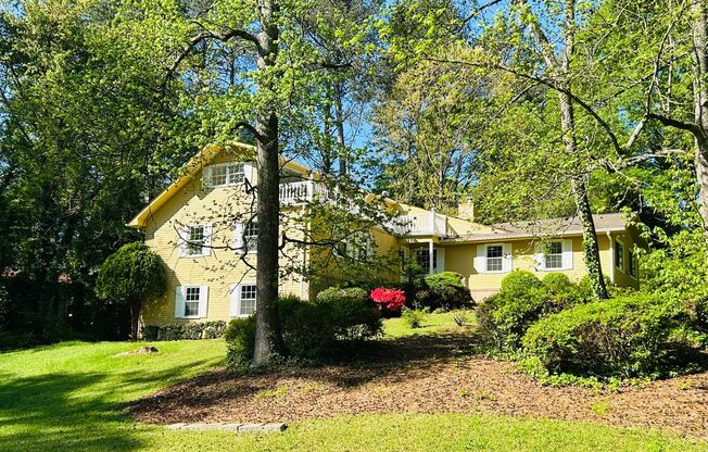 WOW! This 5 bedroom, 3 full bathroom home is a hidden GEM in Gwinnett County! Must see!