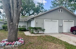 2/1 Townhome Located in Carrollwood WITH Garage and Porch!