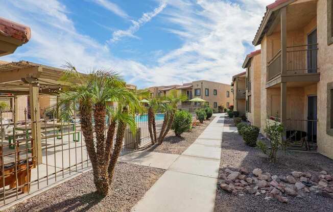 A sunny day at a residential area with a clear blue sky.