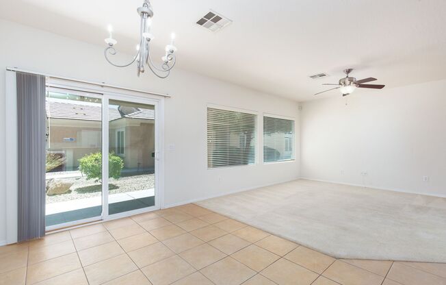 Single story Sun City Aliante home with views of the golf course