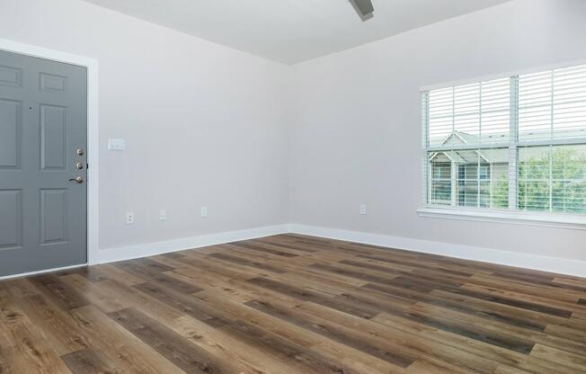BEAUTIFUL HARDWOOD FLOORS AND LOTS OF NATURAL LIGHTING
