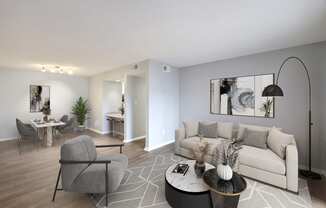 Living room with a couch and a coffee table  at Governors House, Huntsville, 35805