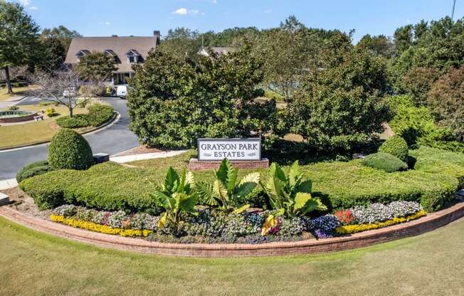 an aerial view of a garden with a sign for garden park estates