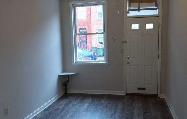 Little Italy Carriage House offering A/C and Laundry