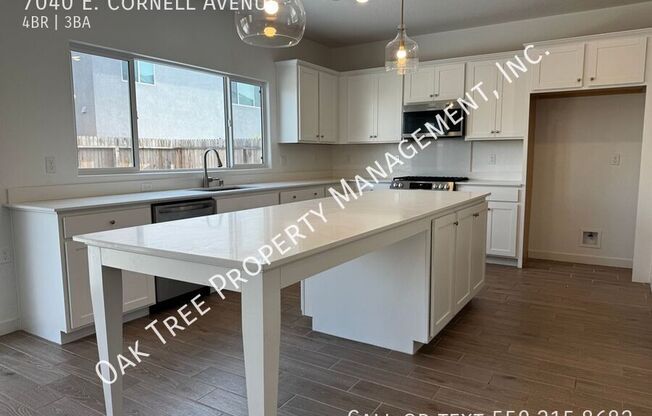 7040 E CORNELL AVE
