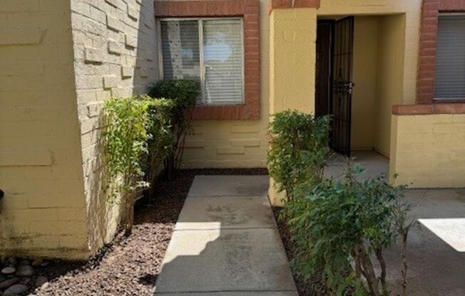 Nice 2 Bedroom 2 Bath Townhome with 2 Car-Garage and Community Pool