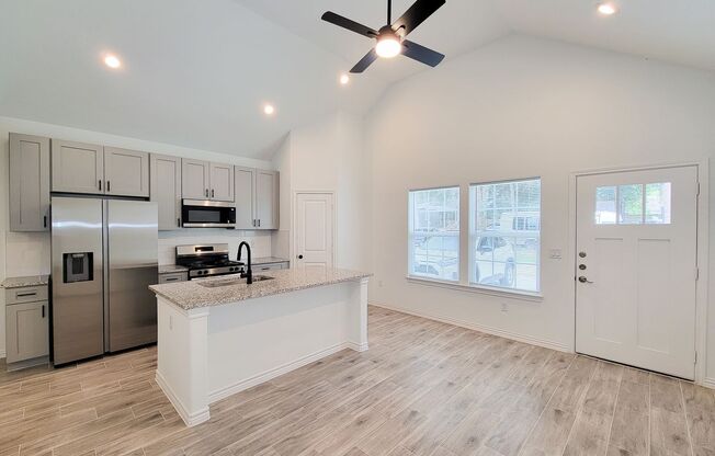 Beautiful single-story 3-bedroom, 2-bath home featuring an open floor plan, kitchen island, 42" soft-close cabinets, stainless steel appliances, large walk-in pantry, and tile flooring throughout. Primary suite includes a walk-in closet and walk-in shower
