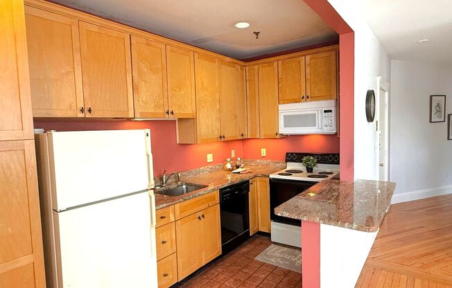 2 Bedroom sunny second-floor corner unit at Reservoir Place Condo in Brighton!