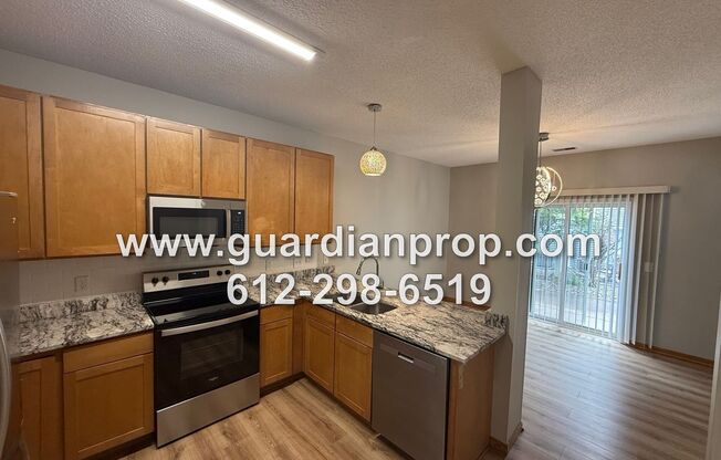 End Unit Townhouse Available Now, Loft Area, Vaulted Ceilings, Patio, 2 Car Garage