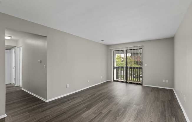 Livingroom with wood style flooring at Creve Coeur, Creve Coeur, MO