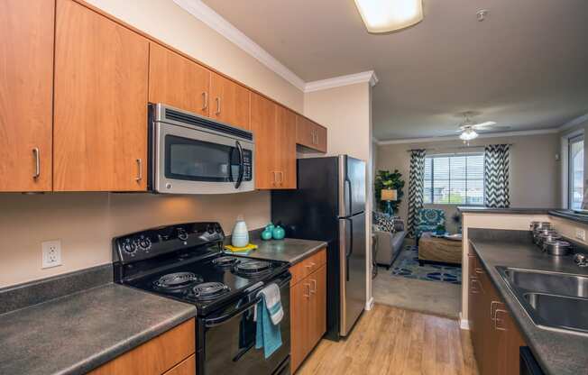 full kitchen with stainless steel appliances and granite counter tops and