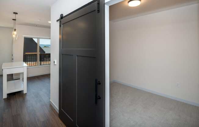 a sliding door in a living room and a dining room at The Crossings at Windsong, Prescott Valley