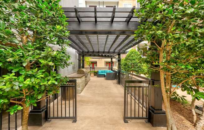 a view of a corridor with trees and a staircase