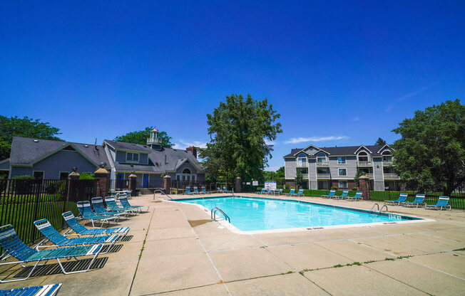 Poolside Relaxing Area at Pine Knoll Apartments, Michigan