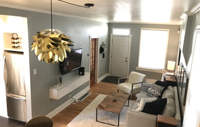 Bright and Cozy 2-Bedroom in Sunnyside with Garage and Yard!