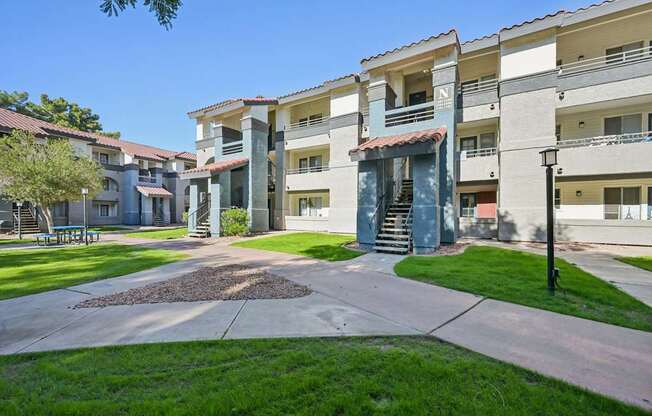 Sunny day at the Stillwater Apartment swith a clear blue sky.