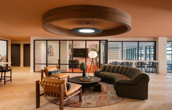 Warm tones, layered textures, and contemporary design set the tone inside Modera Rio Salado’s inviting resident lounge.