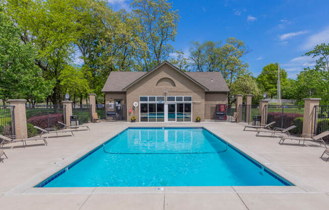 Swimming pool near building at Deerfield Apartments, Olathe, 66062