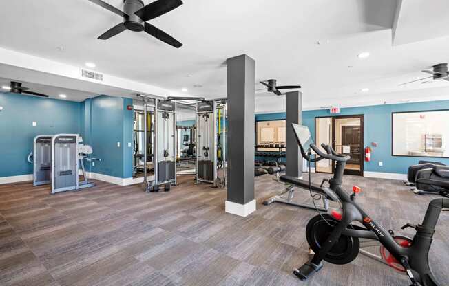 the gym at the flats at big tex apartments