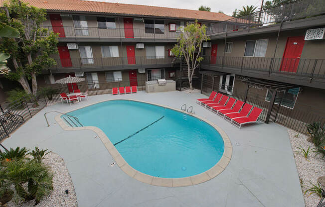 our apartments showcase an unique swimming pool at Dwell Apartment Homes, Riverside, CA