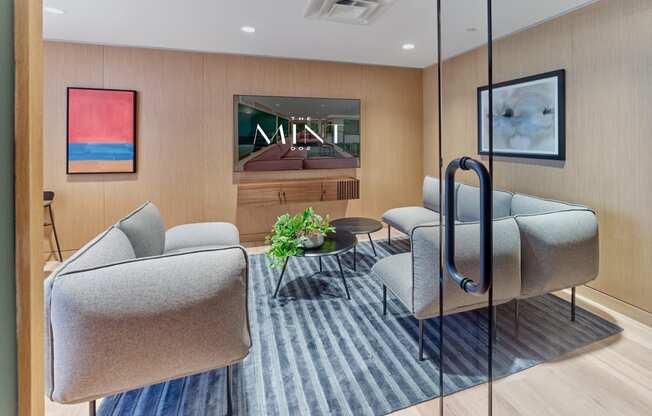 Cozy seating area at The Mint Rahway, featuring stylish furniture and decor, near Merck Pharmaceutical and Rahway Train Station.