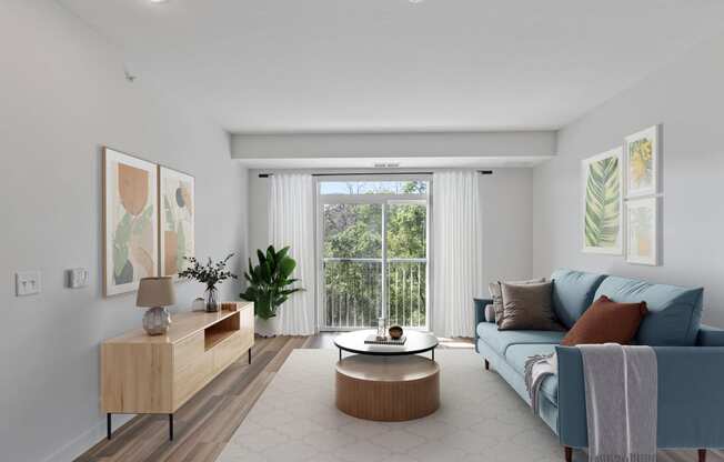 a living room with a blue couch and a coffee table