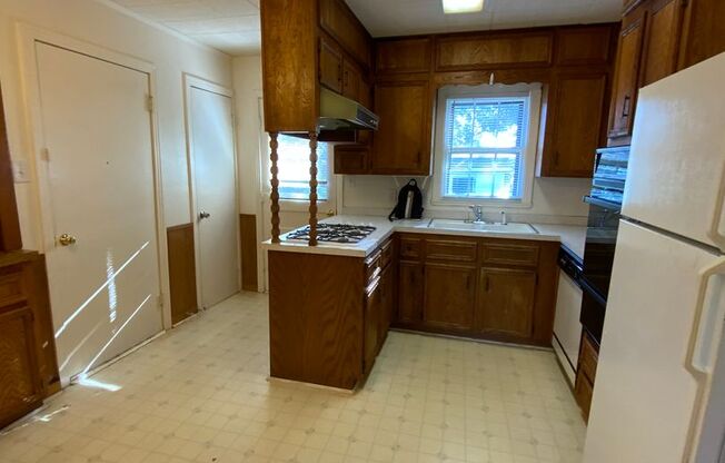 Cottage feel with hardwood flooring!